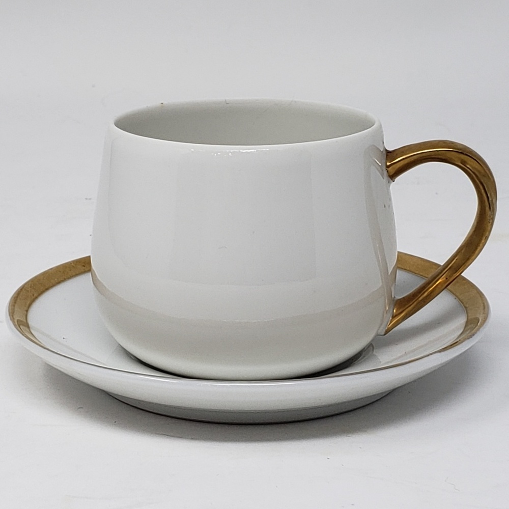 Set of 7 Fitz and Floyd demitasse cups & 9 saucers